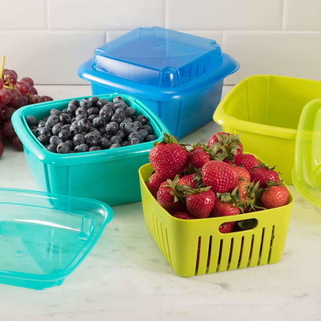 Hutzler Berry Keeper with lid on container for easy fridge storage.