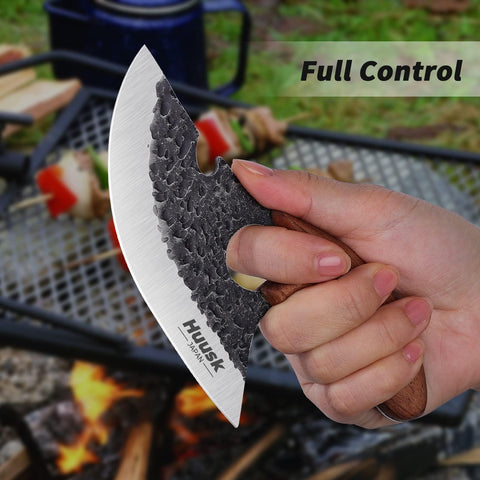 Huusk knife back-slot bottle opener feature in action