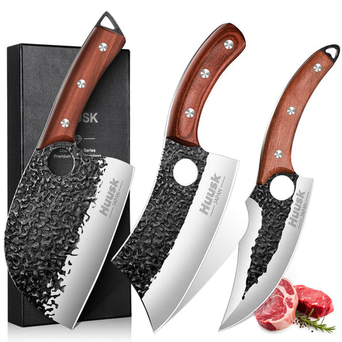 Huusk three-knife set displayed for versatile meat prep and kitchen tasks.