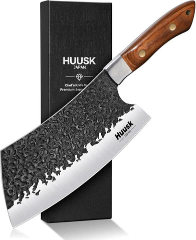 Huusk 7-inch cleaver blade close-up showing hand-forged pattern for clean cuts