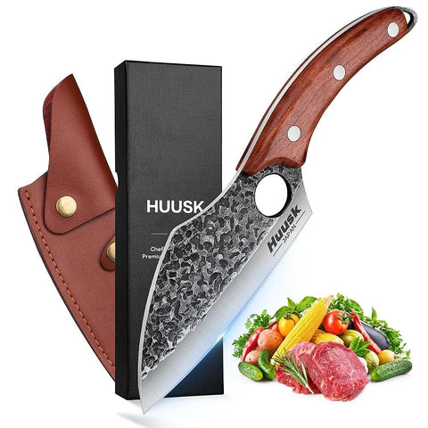 Huusk hand-forged meat cleaver blade close-up showing a sharp edge for precise slicing