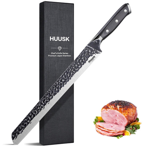 Huusk Japan 11.5-inch blade close-up, showcasing sharp edge for clean meat slicing.