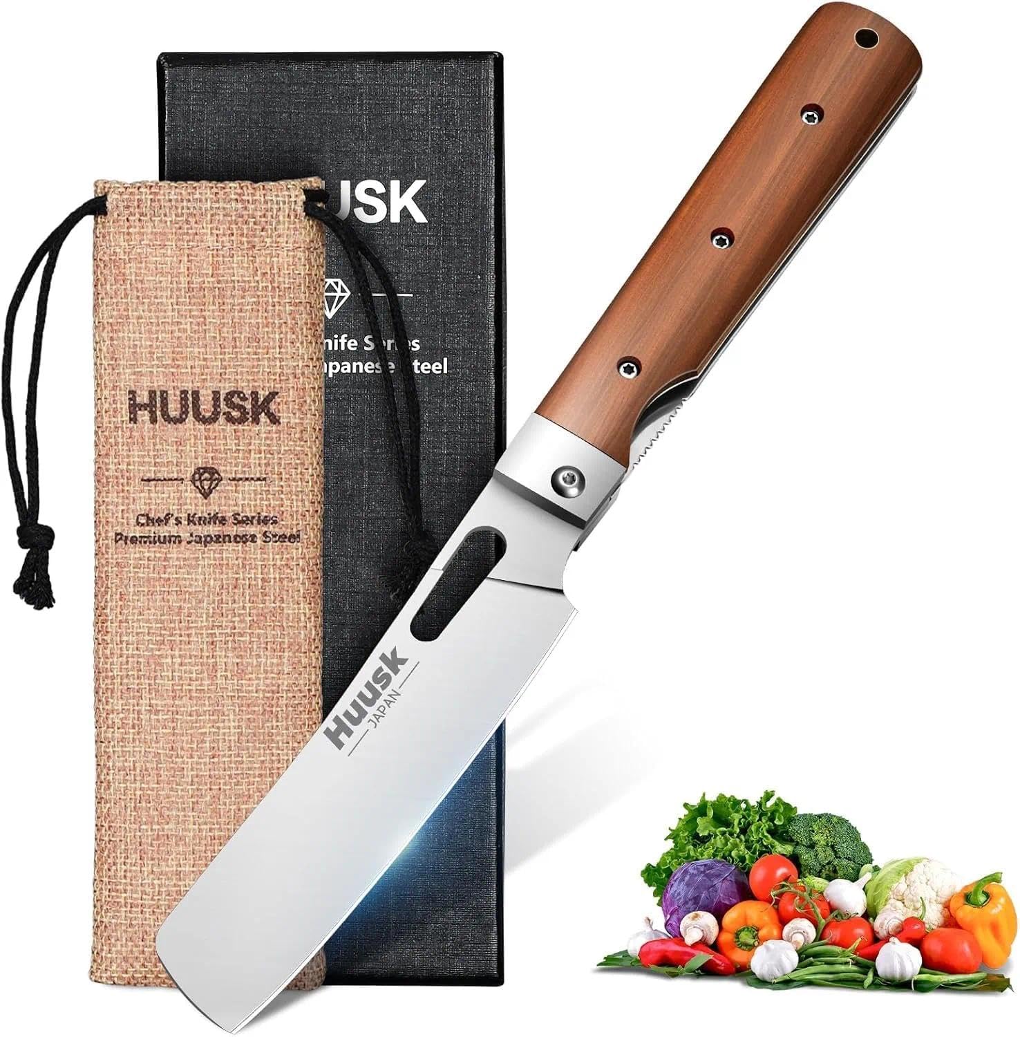 Huusk Nakiri knife blade designed for precise vegetable chopping.