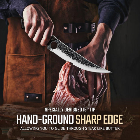 Huusk Viking knife ergonomic handle demonstrates comfortable grip for extended kitchen use.