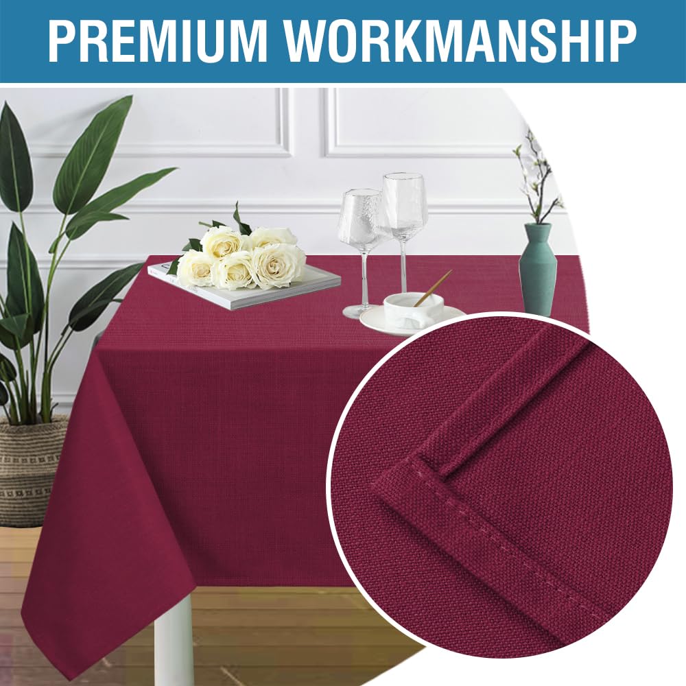 H.VERSAILTEX tablecloth on dining setup shows waterproof, spill-proof protection.