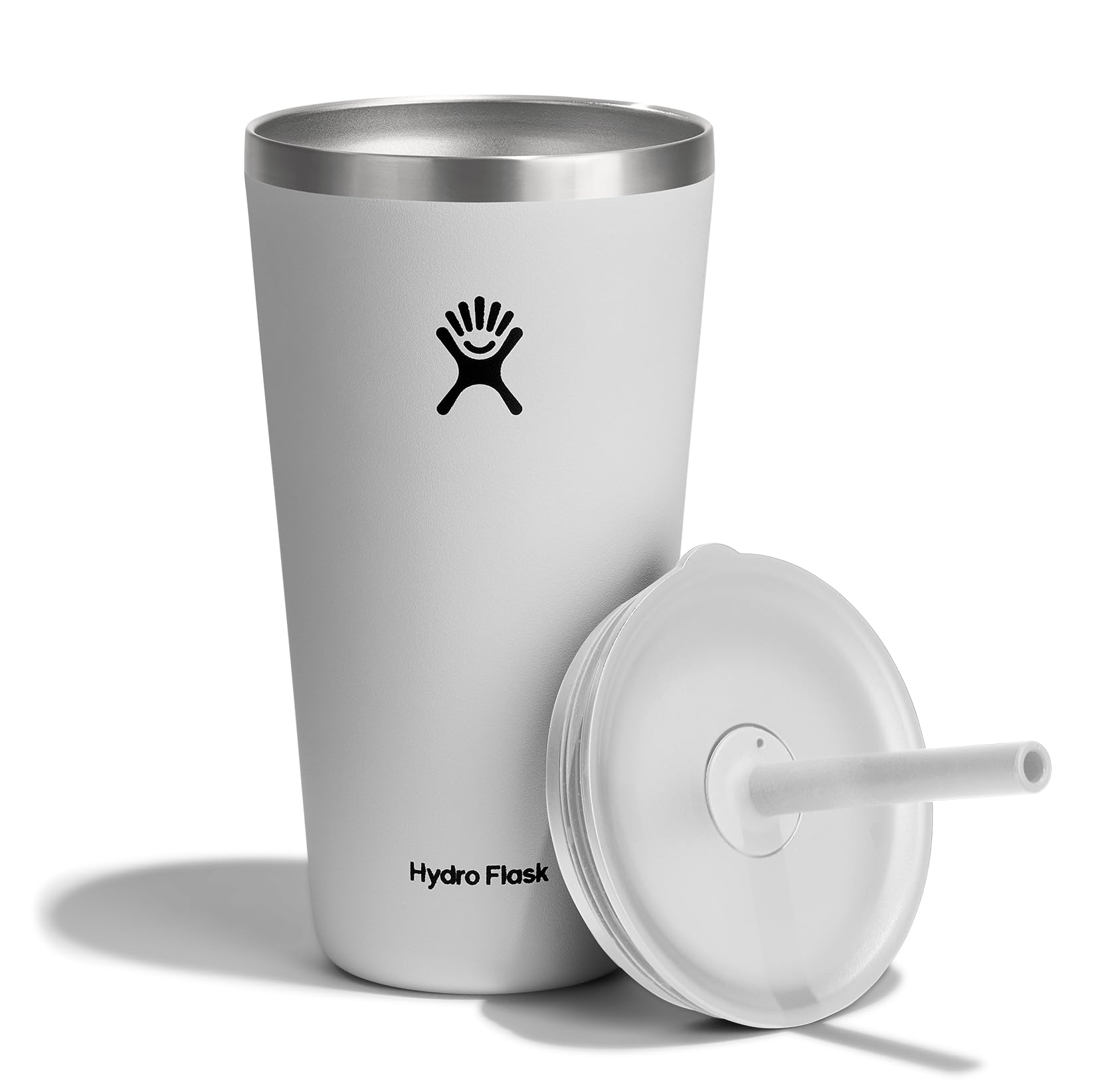 Hydro Flask 28 oz tumbler in white fits most cupholders for easy transport