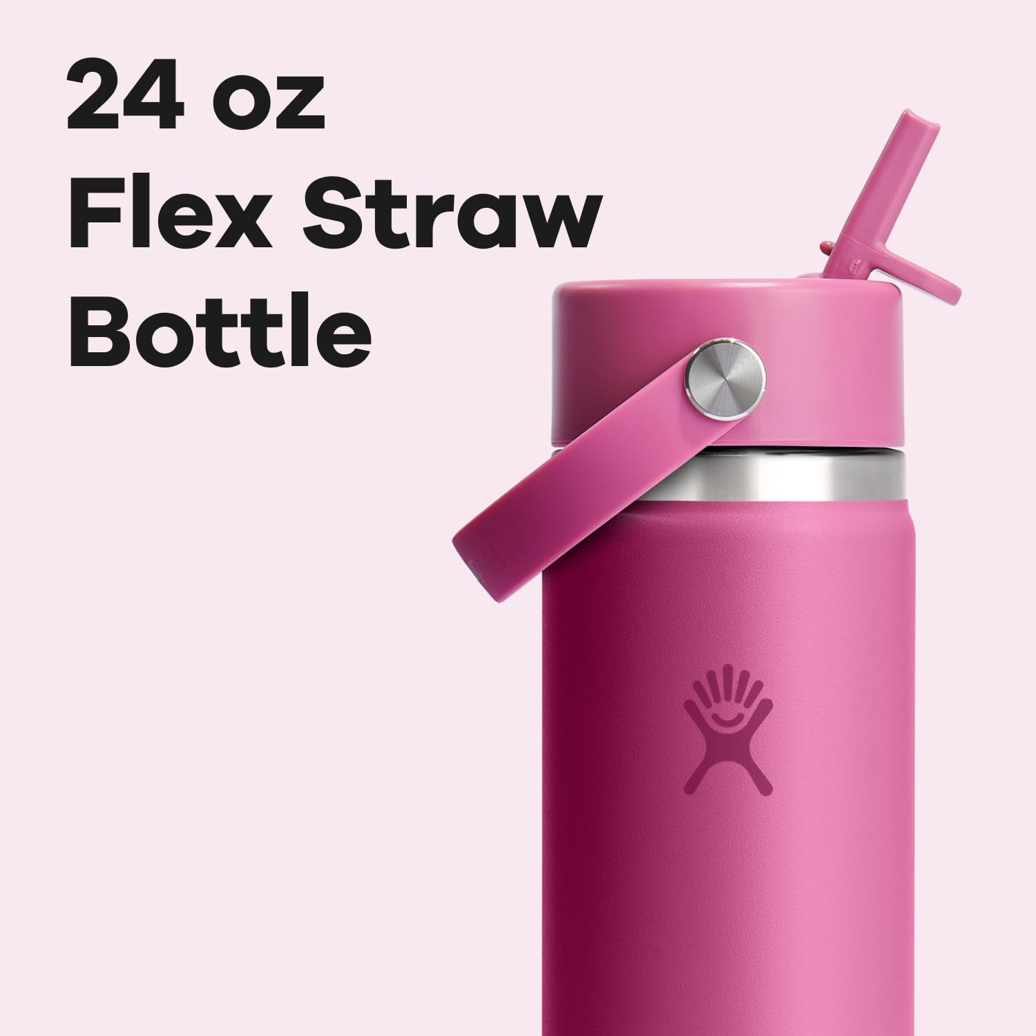 Hydro Flask bottle resting in a car cupholder in reef pink.