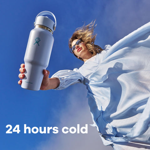 Hydro Flask Travel Bottle 32oz Ivory leakproof cap keeps contents secure during transport.