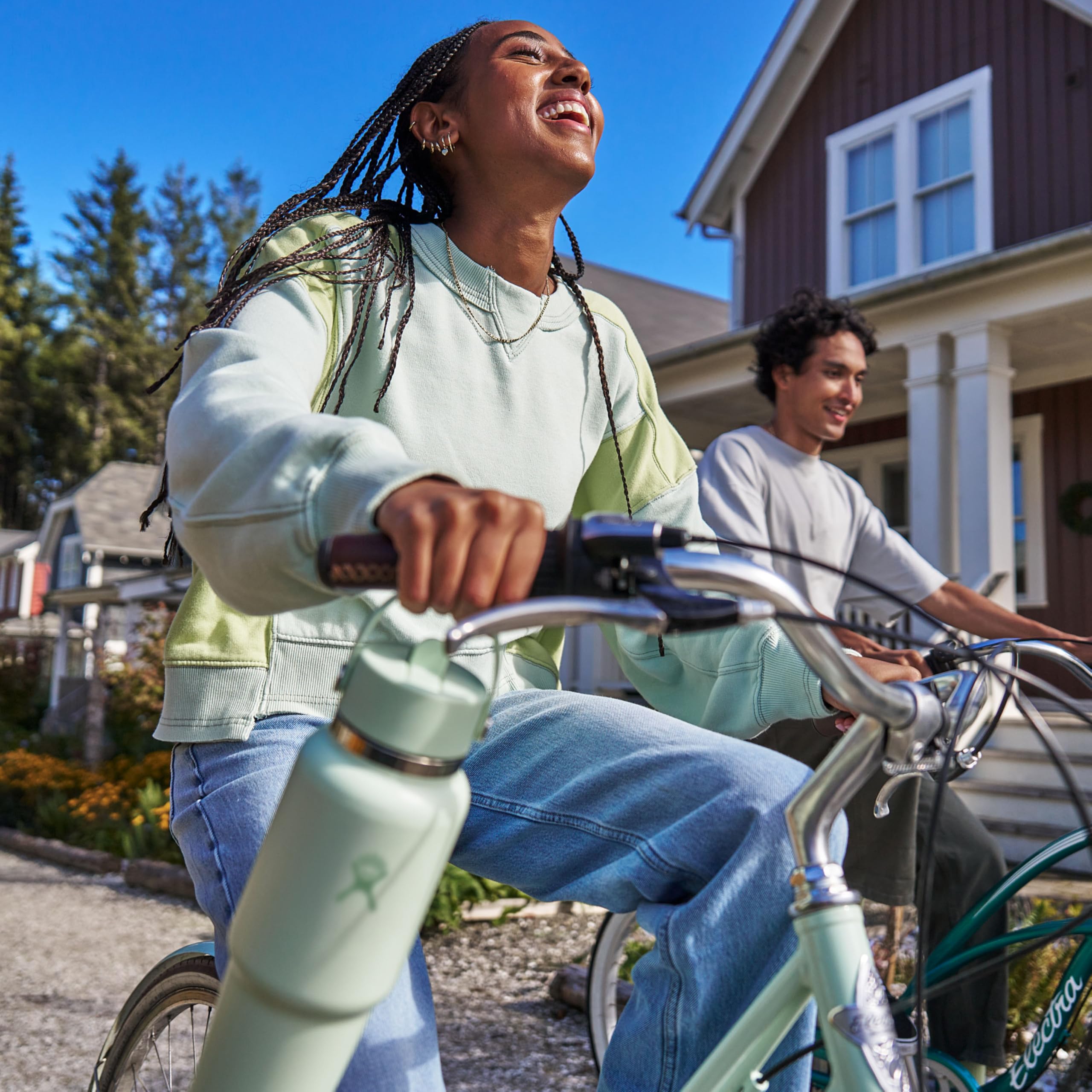 Hydro Flask Travel Bottle 32oz Ivory is cupholder-ready for car and desk use.