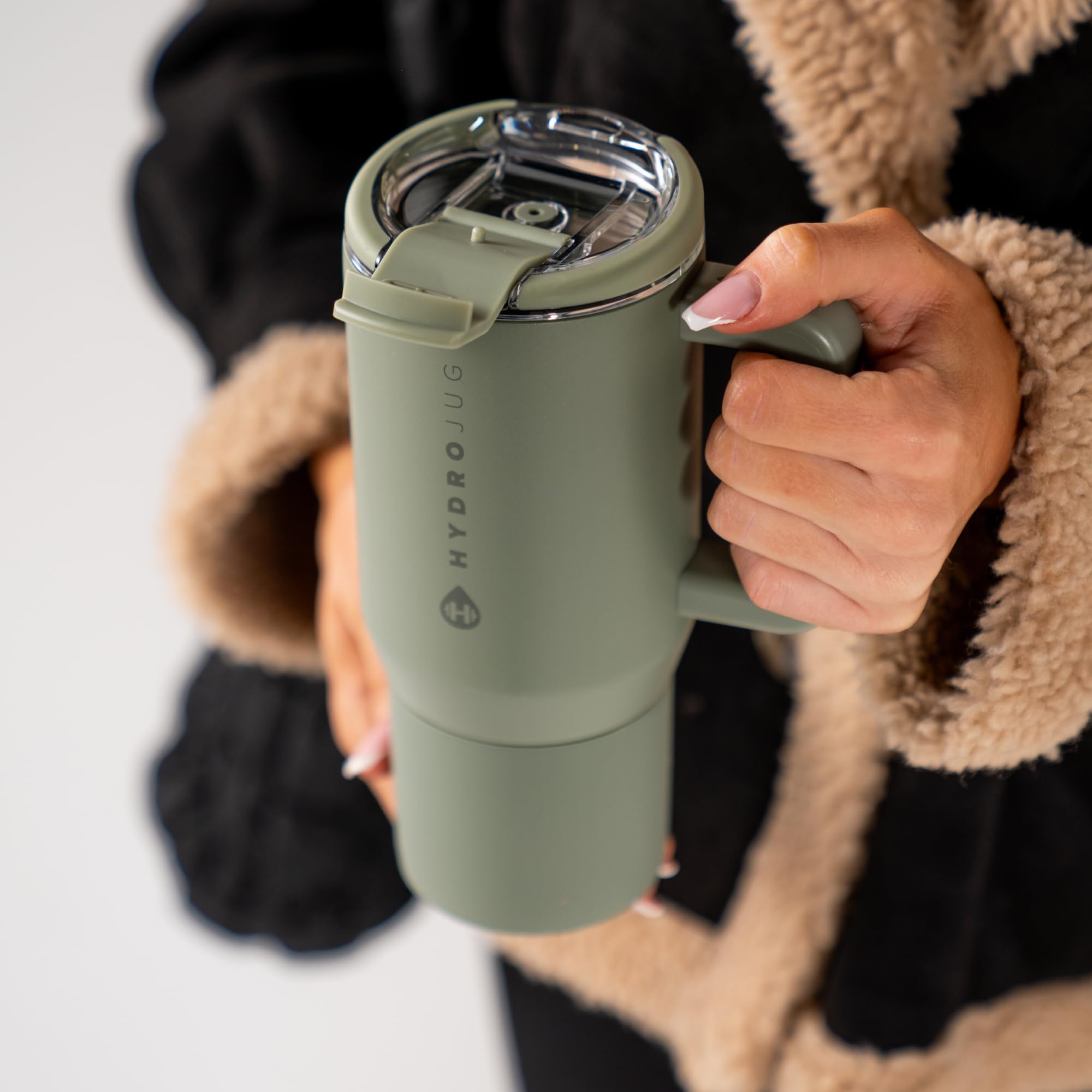 HydroJug Coffee Traveler easy-grip handle and stable base for daily use.