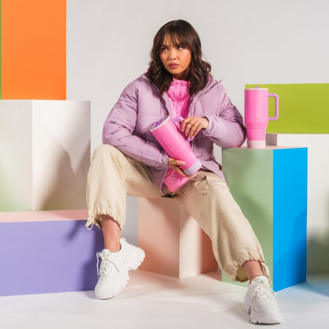 The HydroJug Traveler pink-sugar color adds stylish personalization.