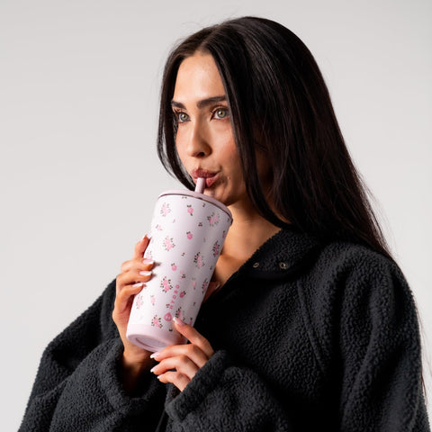 HydroJug Wildrose on-the-go lifestyle with ergonomic design for travel.