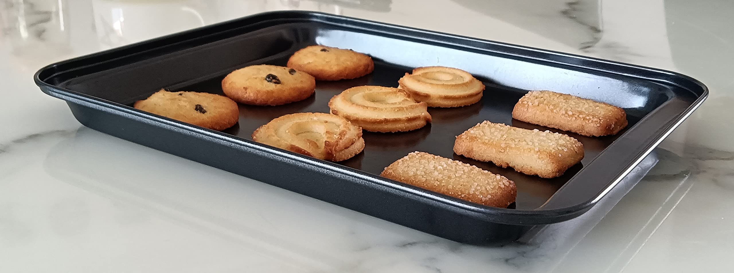 HYTK magnetic-compatible mini pan for convenient storage on a metal surface.