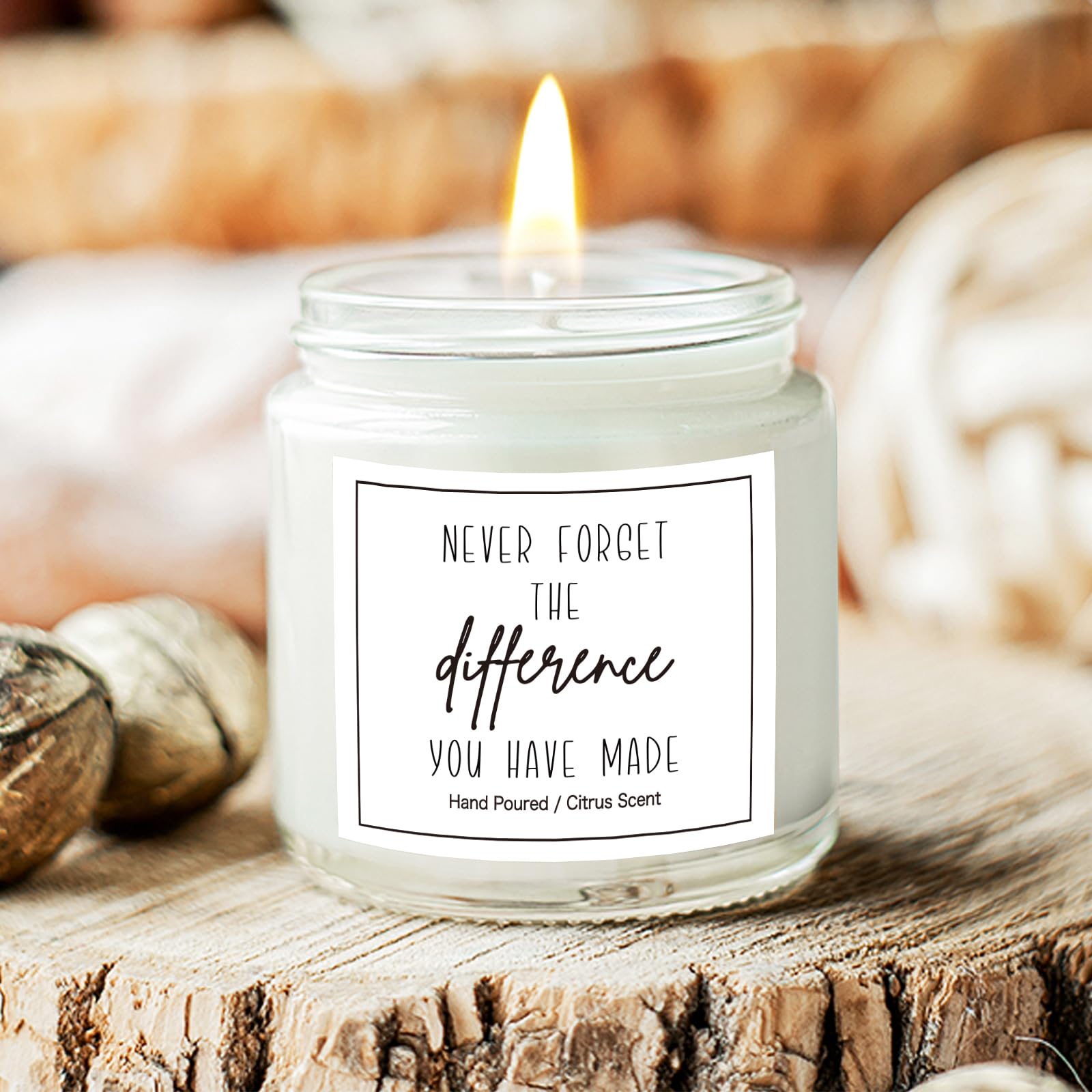 iAOVUEBY candle Never Forget Difference—adds calming ambiance.