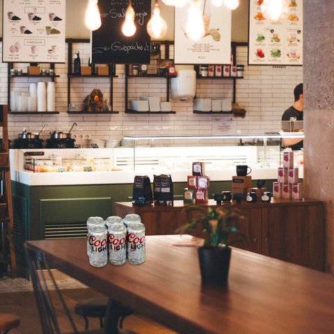 ICE N COLD organizes loose cans for quick grab-and-go shopping.