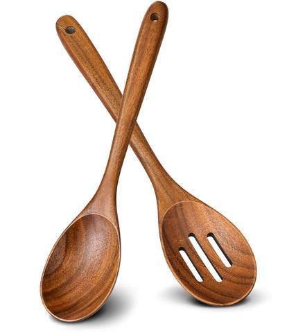 ICSTI teak large spoon in action for stirring with heat resistance