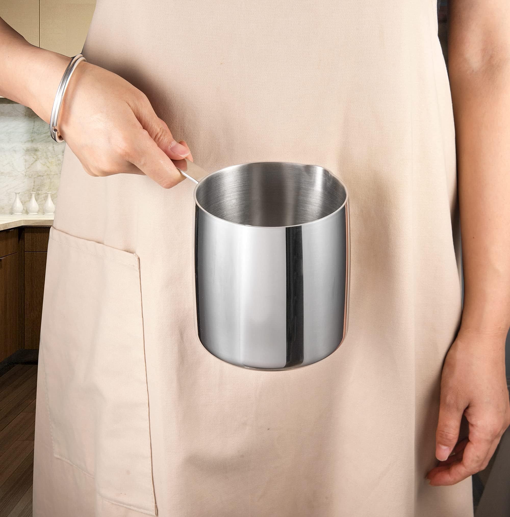 IMEEA Milk Warmer Pot pour spout in action over steaming mug.