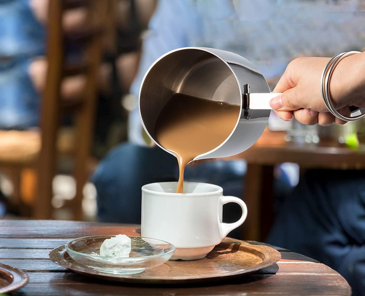 IMEEA Milk Warmer Pot side view highlights sturdy handle and pour spout for controlled pouring.