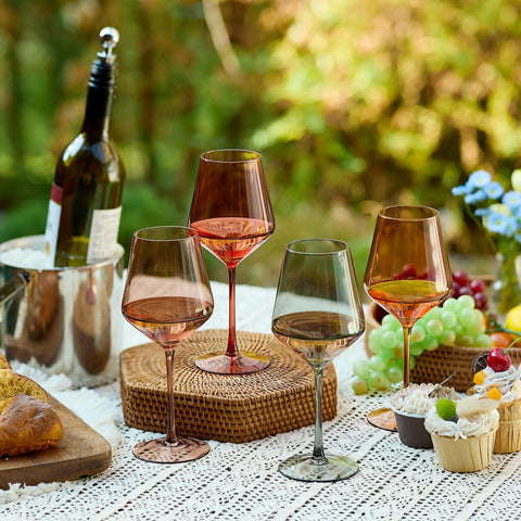 Imourari stemmed colored wine glasses in amber crystal for elegant entertaining.