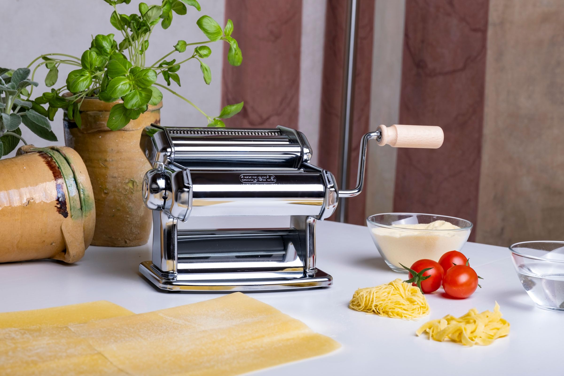 Imperia pasta maker cleaning brush assists quick, thorough roller cleaning after use.