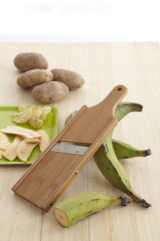 Imusa Mariquitera wooden slicer for even vegetable slices.