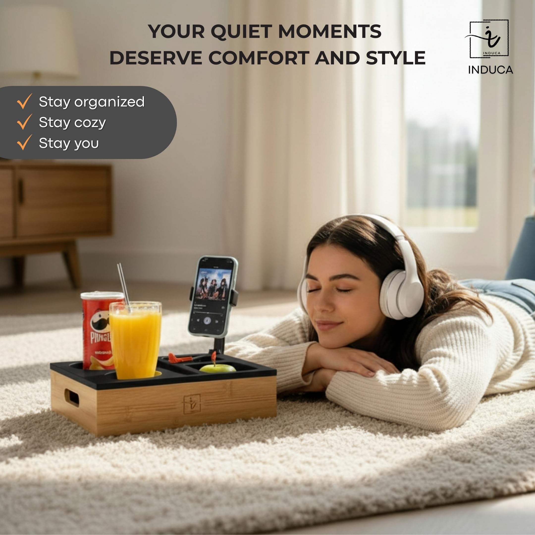 INDUCA Couch Caddy remote slots keep remotes organized and accessible.