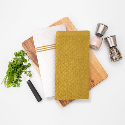 Infinitee Xclusives radiant yellow towels brighten and refresh your kitchen space.