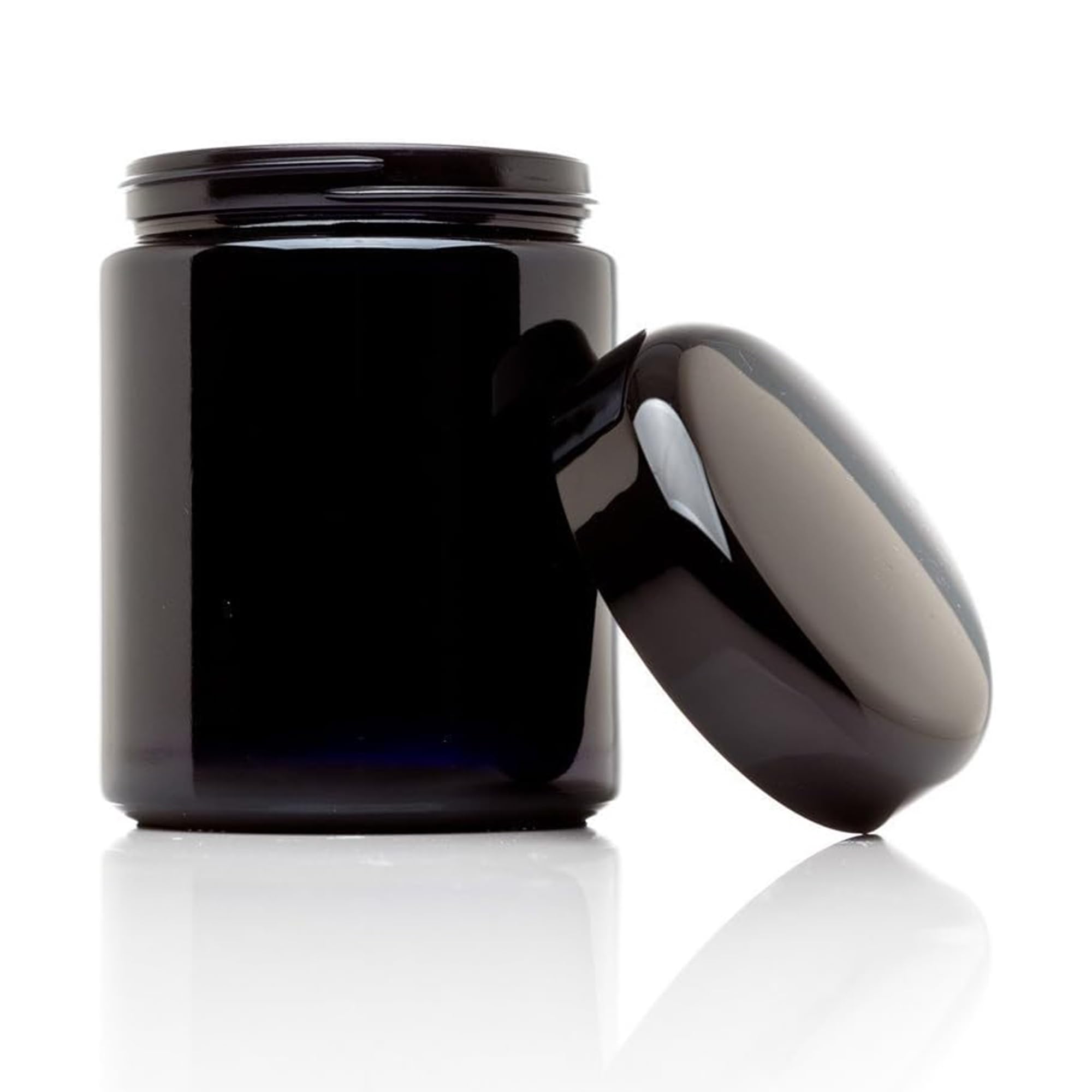 Infinity Jars tight screw-top closure on a black glass jar provides airtight storage and odor control.