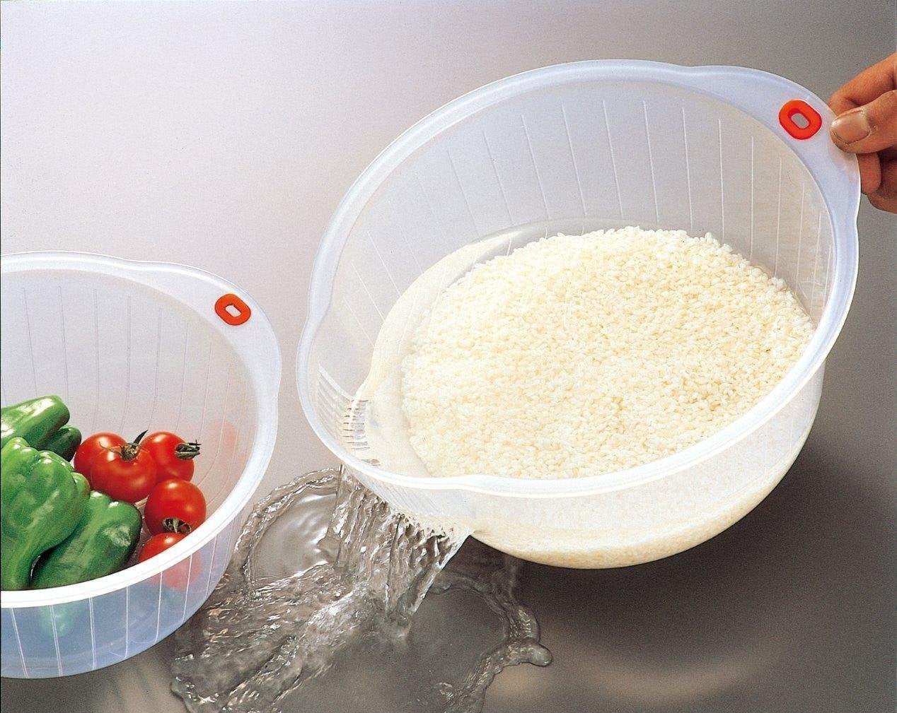 Inomata rice speed washing bowl with side and bottom drainers for quick rinsing.