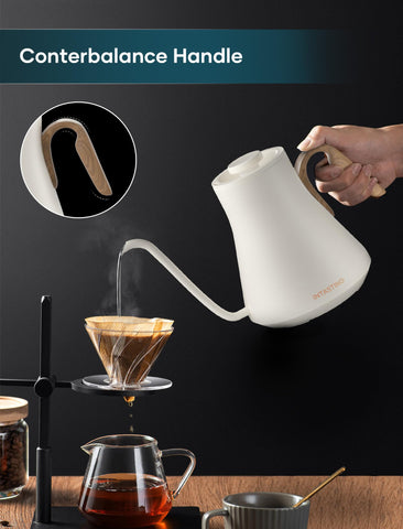 INTASTING electric kettle cream white handle showing ergonomic design for comfortable pouring.