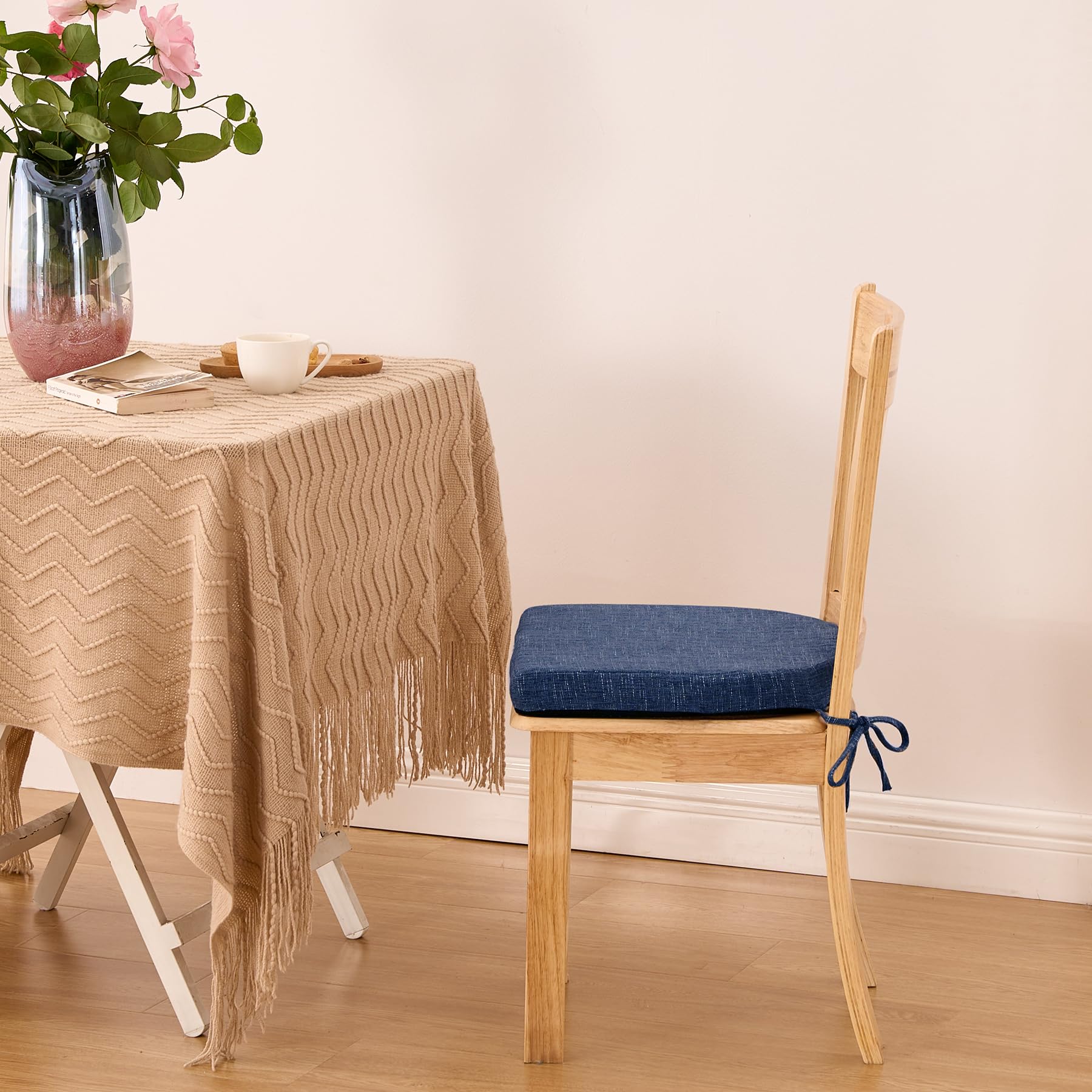 IPYNBAP set of four navy chair pads elevates dining room aesthetics.