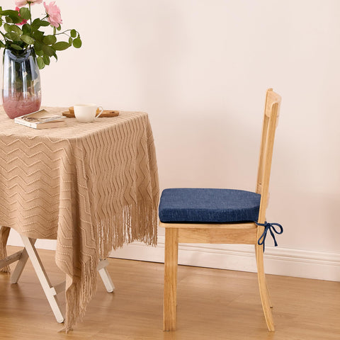 IPYNBAP set of four navy chair pads elevates dining room aesthetics.