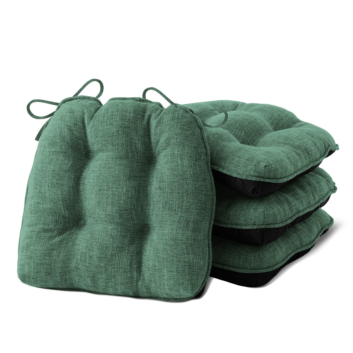 IPYNBAP four-pack dining chair cushions fitted securely on chairs.