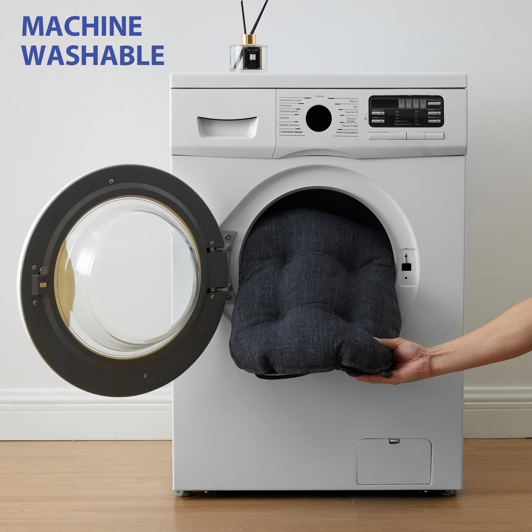 IPYNBAP navy blue cushion being spot cleaned for easy maintenance