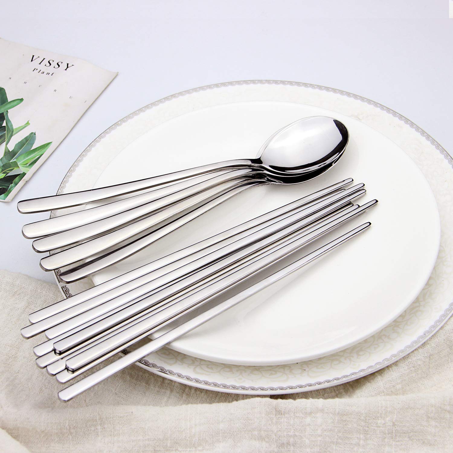 IQCWOOD dinner spoon close-up shows sturdy, smooth-edge dining tool.