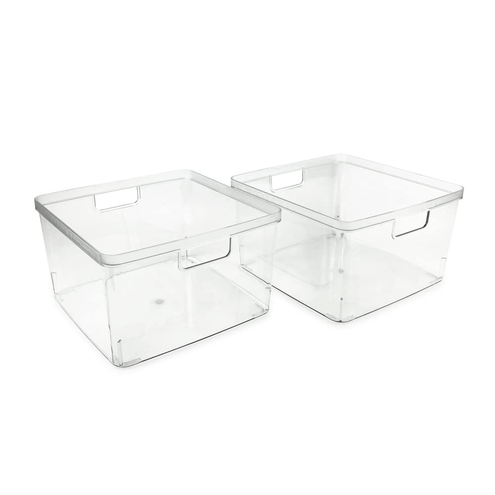 Isaac Jacobs clear storage bin on fridge shelf helps organize cheeses, jams, and snacks.