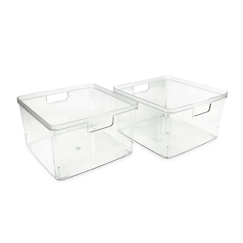 Isaac Jacobs clear storage bin on fridge shelf helps organize cheeses, jams, and snacks.