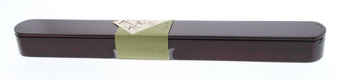Ishida Daruma lacquer case close-up reveals texture