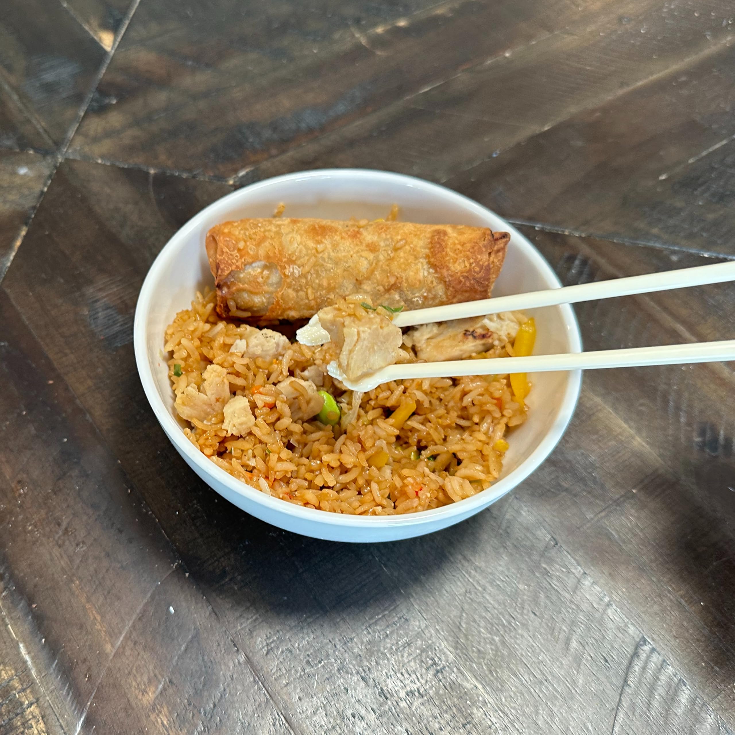 Island Dogs Helping Hands Chopsticks demonstrate an ergonomic grip during casual table use.