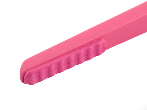 isnack snack tongs on a tidy gaming desk with chips