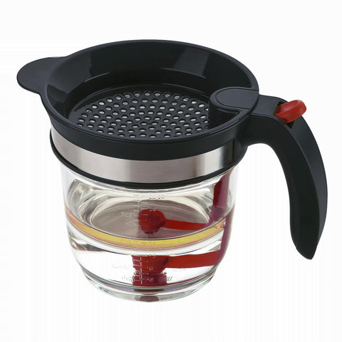 IVYHOME fat separator top lid strainer catches debris before pouring.