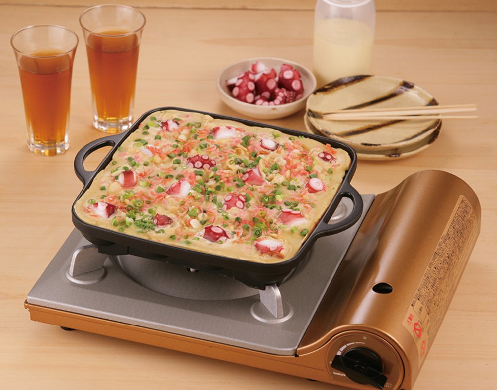 Iwatani Takoyaki grill pan stacked image illustrates compact storage.