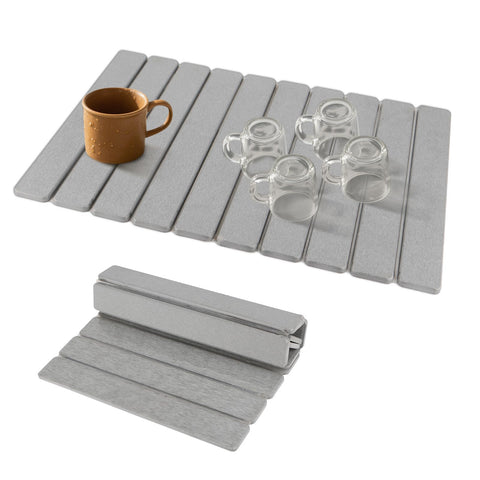 iWEDN diatomite dish drying mat displaying rapid absorption on a kitchen counter
