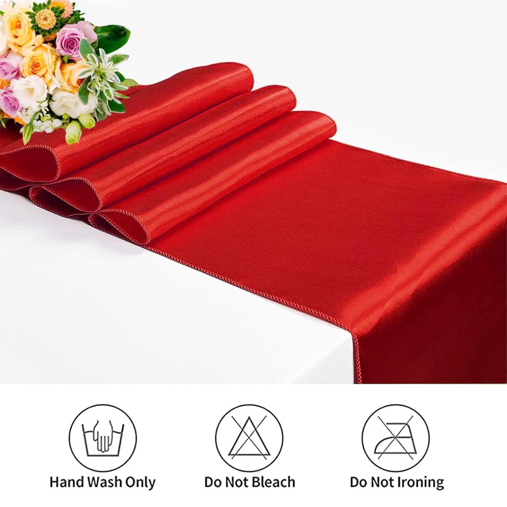 IYARKAI red satin table runner tied with a bow for a festive centerpiece