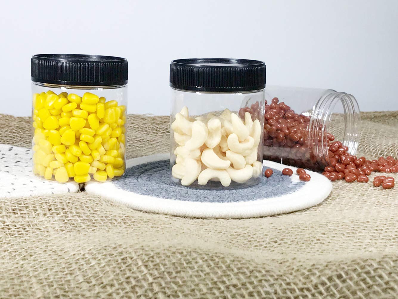 Janisfirst clear plastic jar ideal for dry foods and snacks.