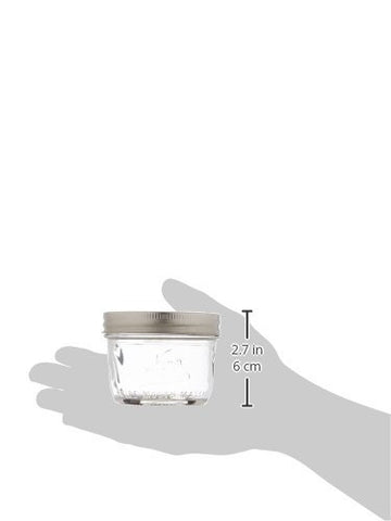 Jarden Kerr wide-mouth half-pint jar with bands, great for gifting, décor, and pantry organization.