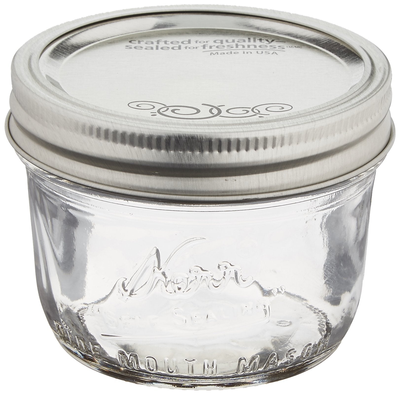 Jarden Kerr wide-mouth half-pint jar with lids, ideal for long-lasting seals and versatile storage.