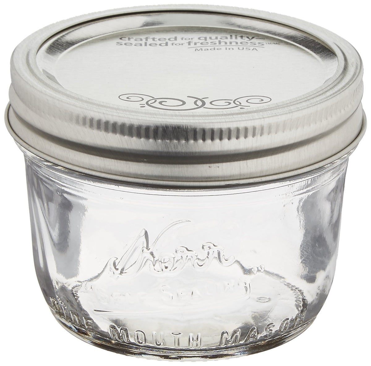 Jarden Kerr wide-mouth half-pint jar with lids, ideal for long-lasting seals and versatile storage.