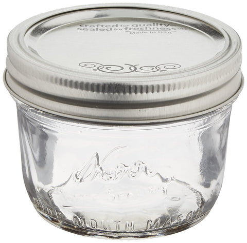 Jarden Kerr wide-mouth half-pint jar with lids, ideal for long-lasting seals and versatile storage.