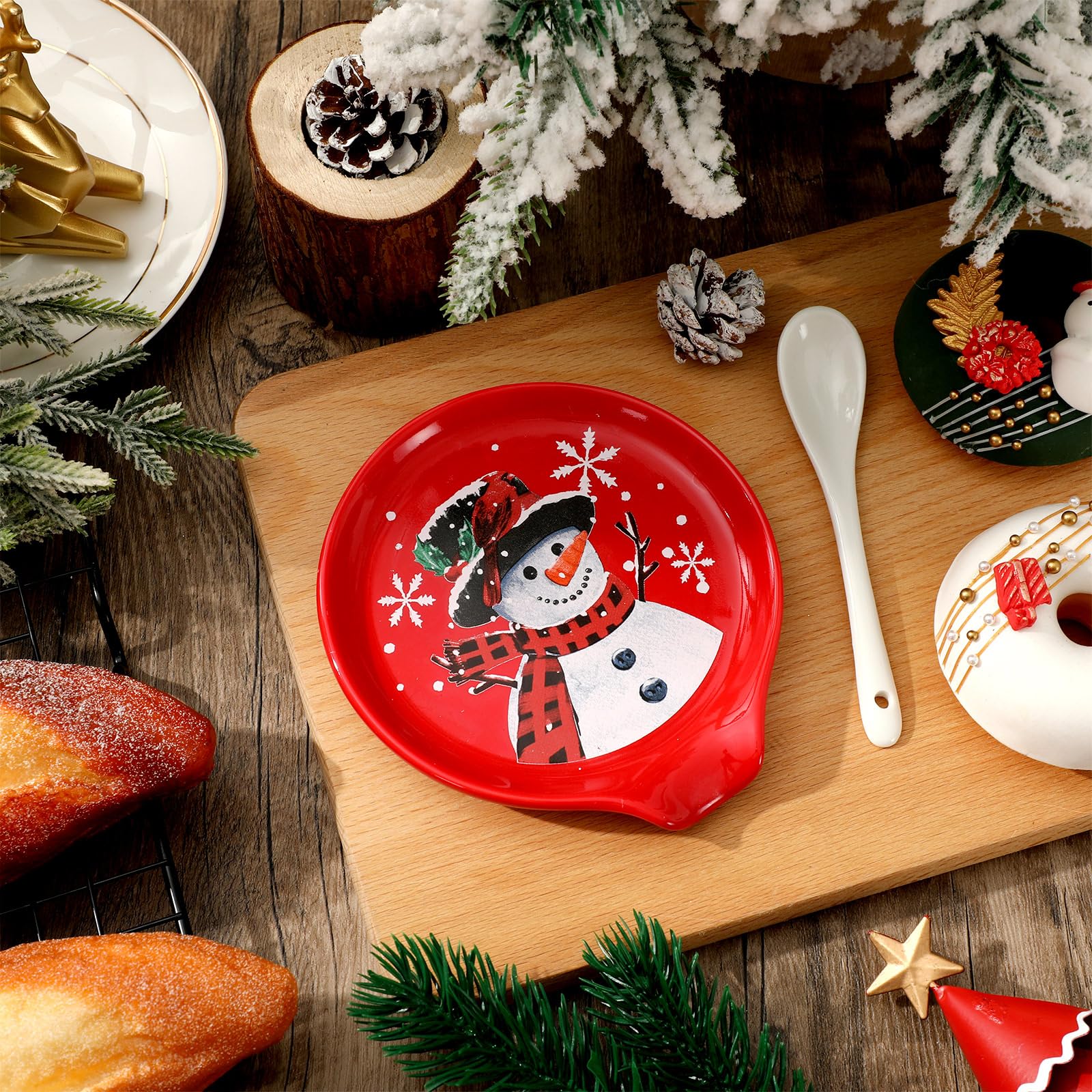 JarThenaAMCS red-background spoon rest adds winter whimsy during hot drinks.